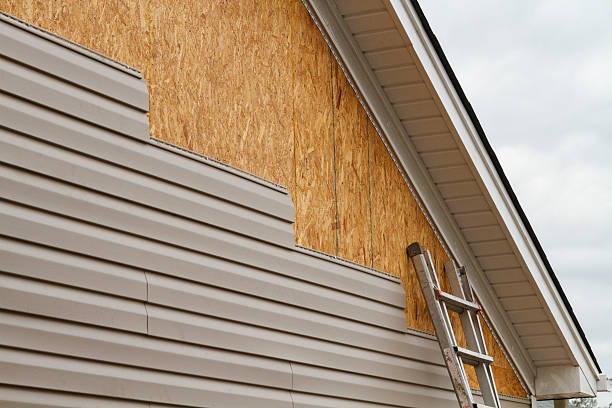 Professional Storm Damage Siding Repair technician working in Newark, OH